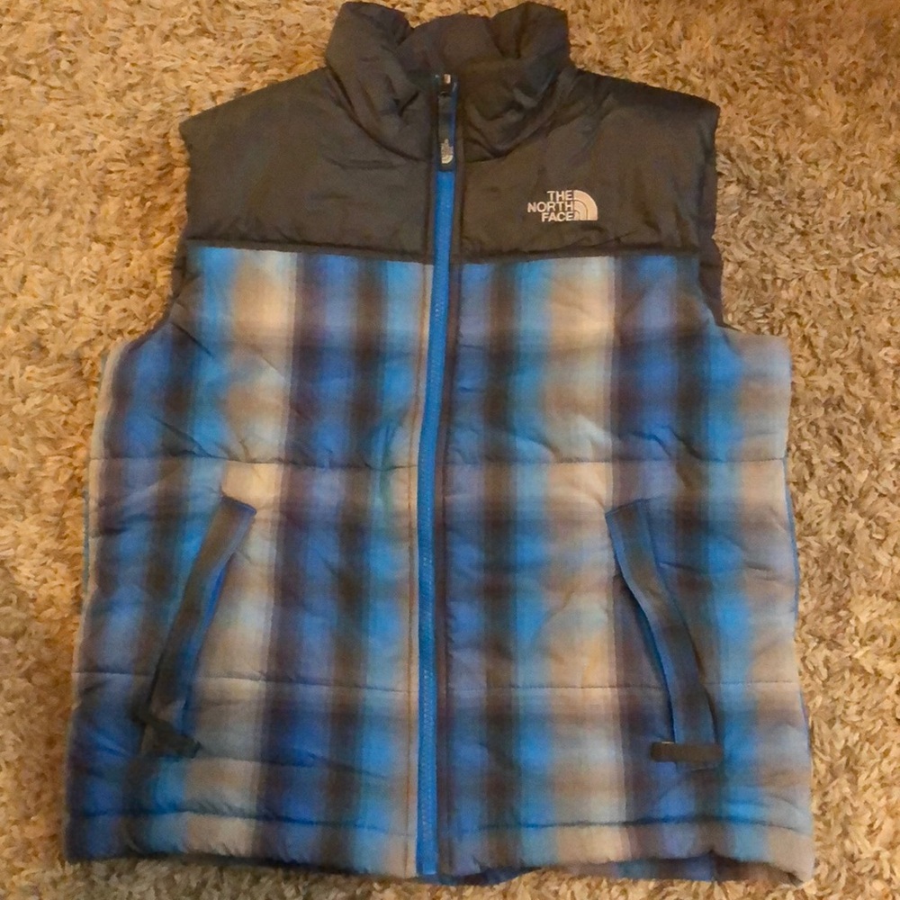 North Face gray and blue puffer vest.